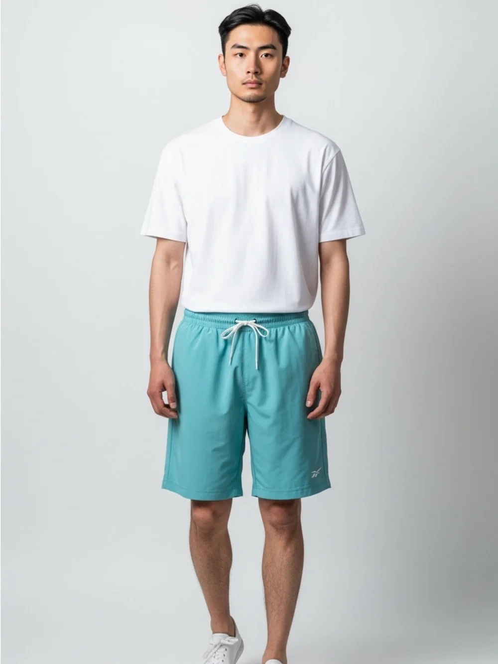 Men’s Reebok Teal Elastic-Waist Swim & Athletic Shorts•S